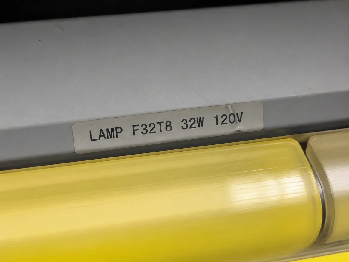 A fixture label close enough to read: LAMP F32T8 32W 120V